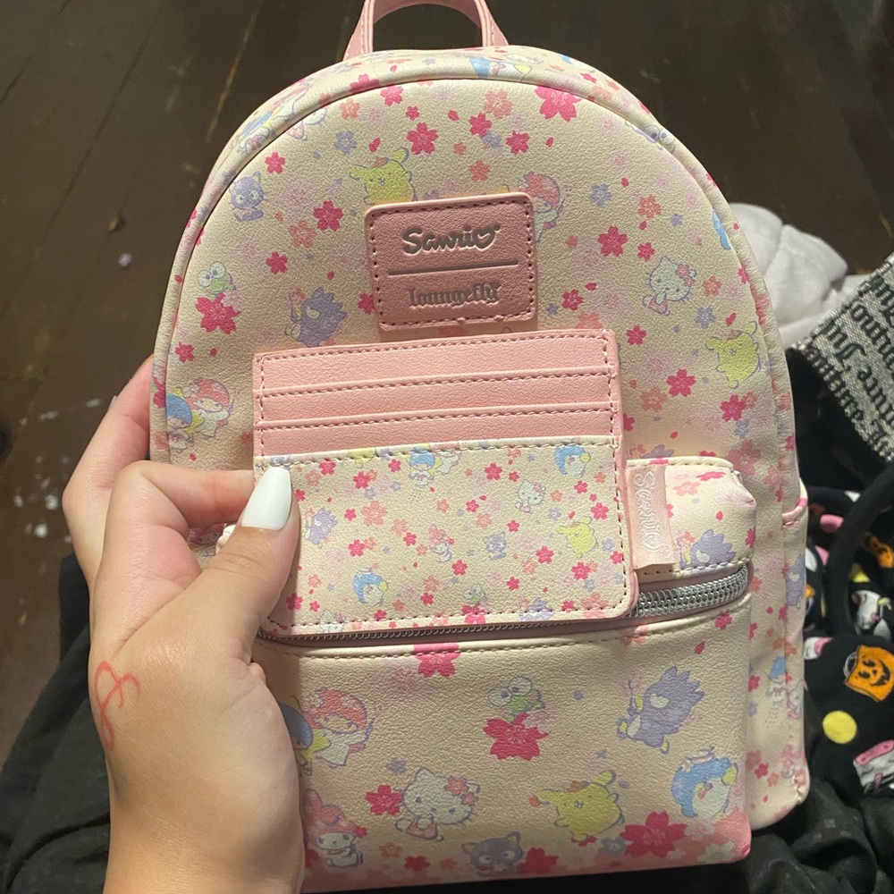 Brand New Never Worn Sanrio Loungefly Book Bag!